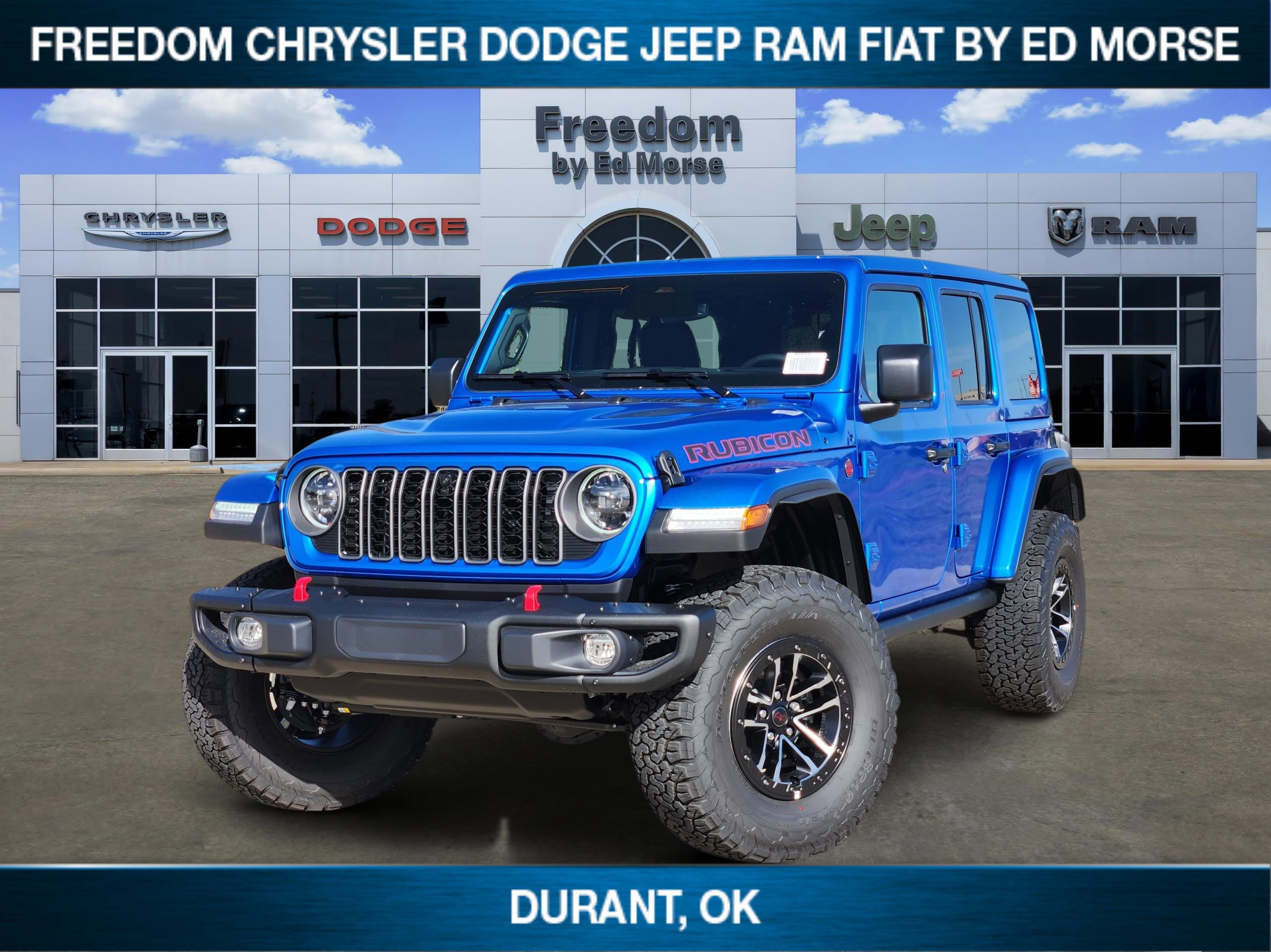 2026 Jeep Wrangler Rubicon X in Hydro Blue Pearl-Coat Exterior Paint — front three-quarter view