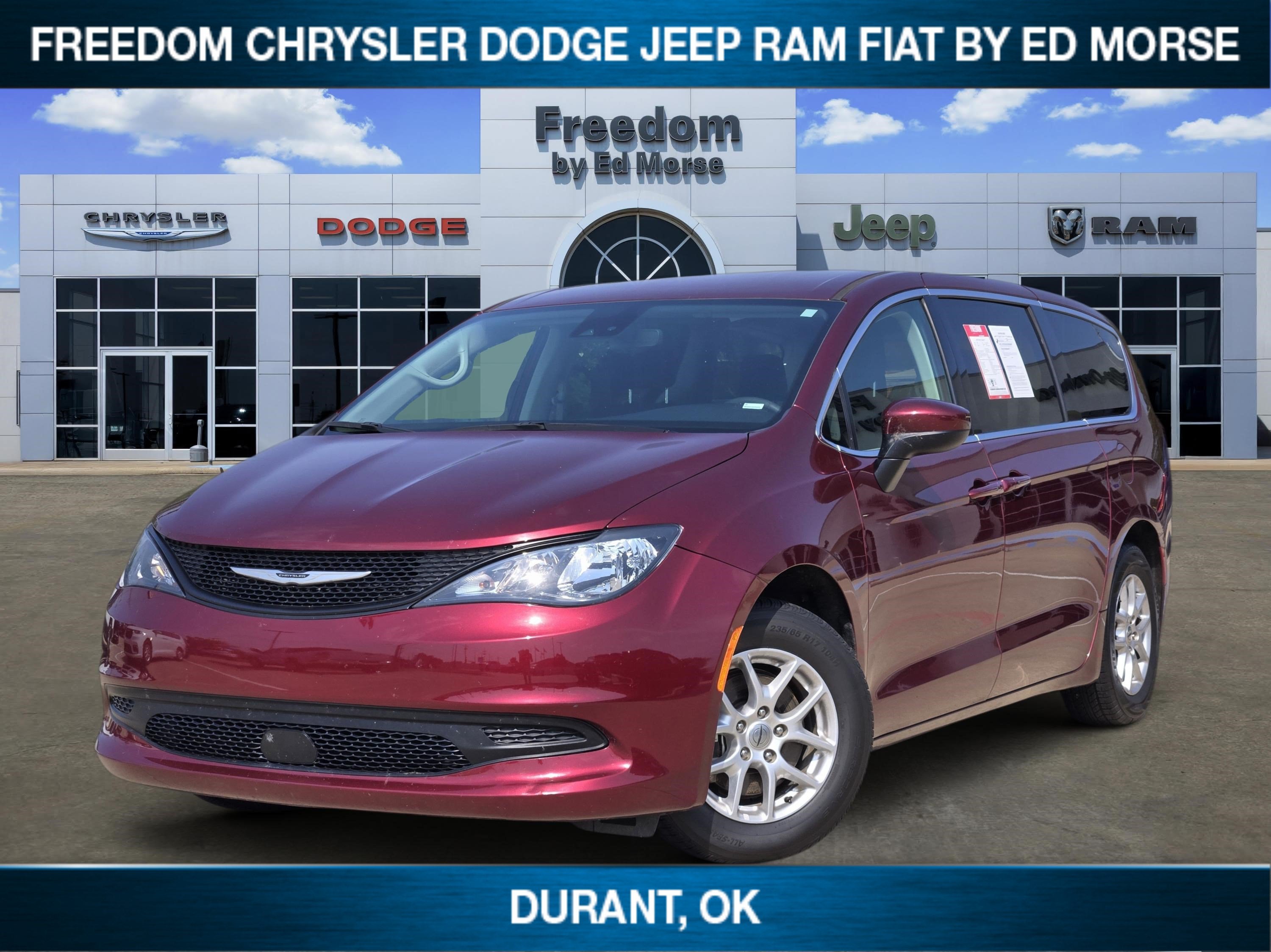 2023 Chrysler Voyager LX in Velvet Red Pearlcoat — front three-quarter view